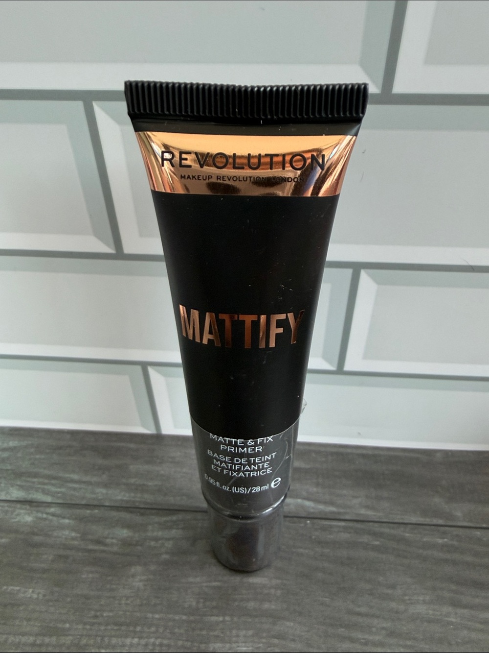 Revolution Mattify Oil-Control Primer in Black with Rose Gold Trim